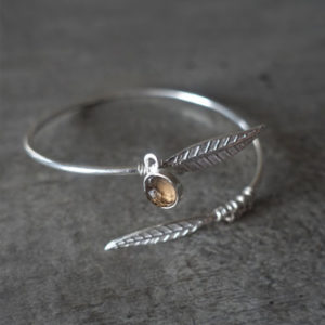 Silver feather bracelet with smoked quartz