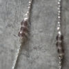 Silver feather necklace with smoked quartz Silver feather necklace with smoked quartz