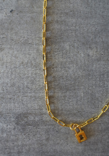 gold padlock and large links chain