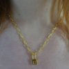 SITE SECRET 4 gold padlock and large link chain